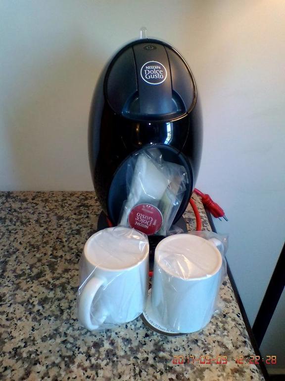 Hotel Victoria Mérida Dış mekan fotoğraf A coffee machine